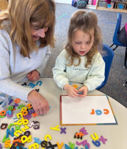 children spelling words at Magical Beginnings Learning Center at Essex